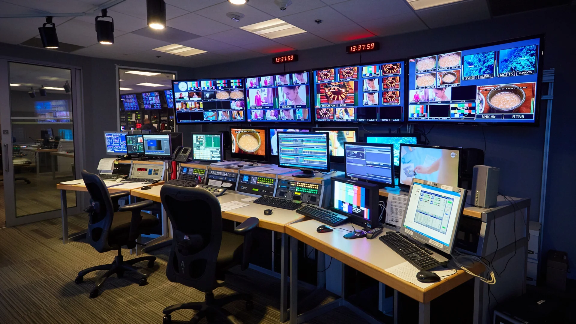 Remote broadcast production control room handling live sports feeds from multiple venues simultaneously